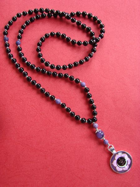 Onyx and Lotus OM Pendant, Bracelet